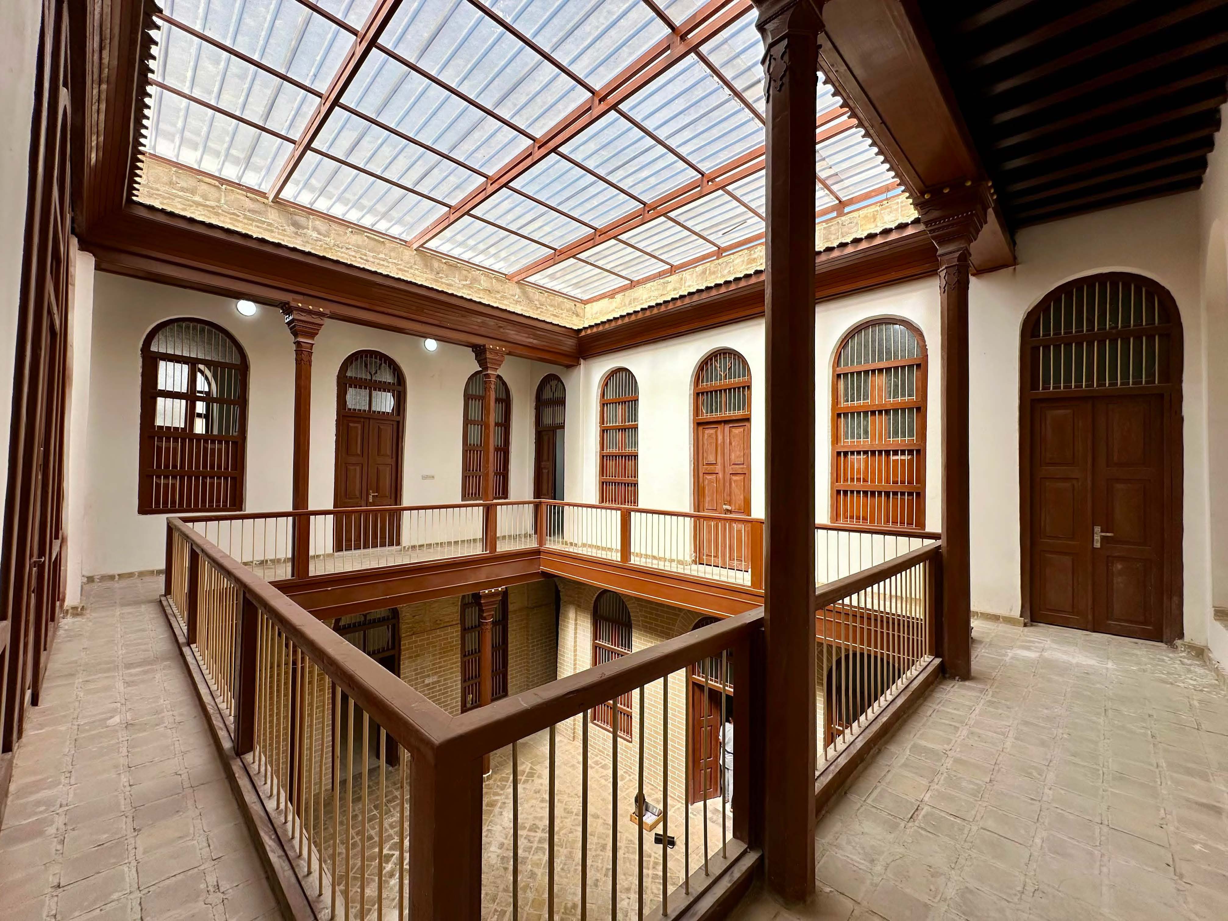 Restored heritage courtyard with Shanasheel windows